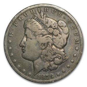 An 1878 Morgan Silver Dollar in fine condition shows clear signs of being used and may look dull.]