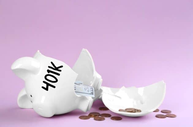 An image of a broken piggy bank to symbolize the decline in 401k savings in 2022
